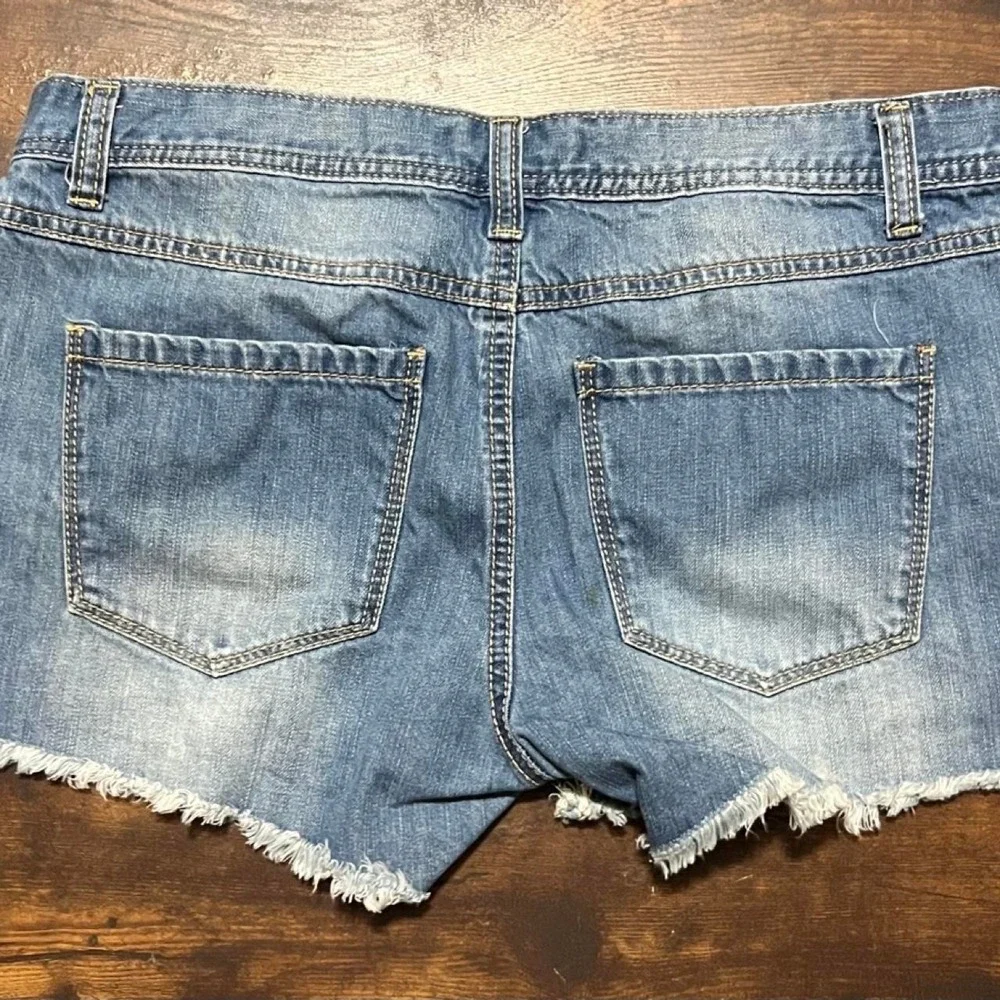 Blue asphalt denim shorts with frayed hem, size 9 317.5